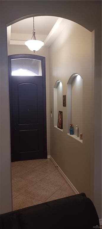 1805 Black Stone St, Edinburg, TX 78542 - doorway to outside with tile patterned flooring and baseboards