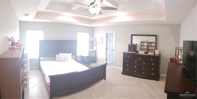 1805 Black Stone St, Edinburg, TX 78542 - bedroom featuring a raised ceiling, multiple windows, and baseboards
