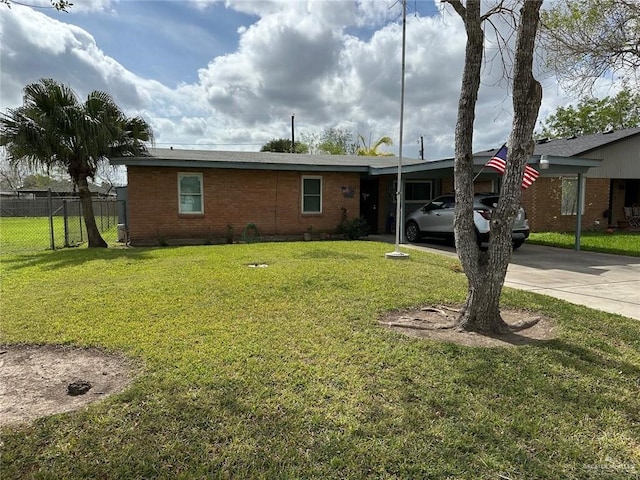 ranch-style house with a carport and a front lawn