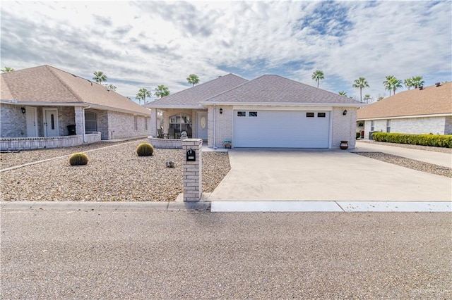 single story home featuring a garage