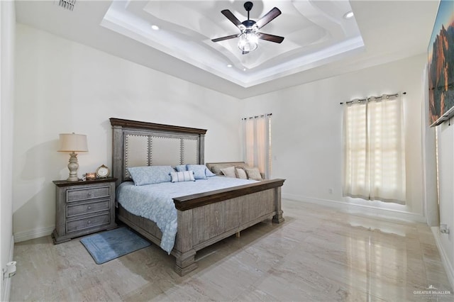 22303 Uresti Rd, Edinburg, TX 78542 - bedroom featuring a raised ceiling, recessed lighting, and a ceiling fan
