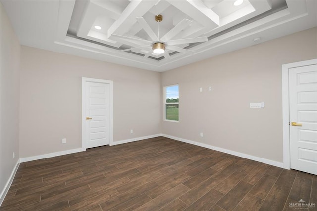 empty room featuring ceiling fan and dark hardwood / wood-style floors