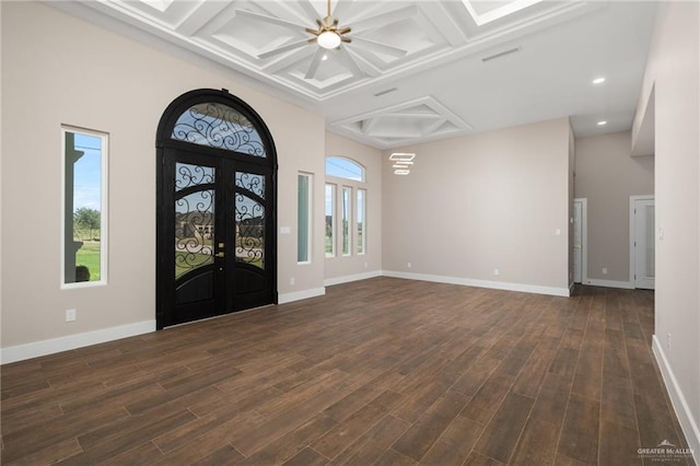 foyer entrance featuring coffered ceiling, ceiling fan, dark wood-type flooring, and french doors