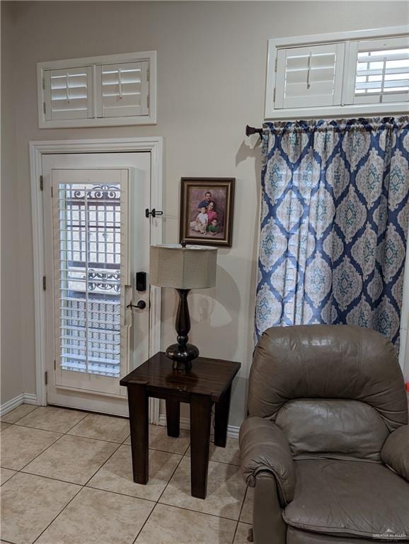 entryway featuring plenty of natural light and light tile patterned floors