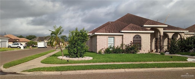 exterior space with a front yard