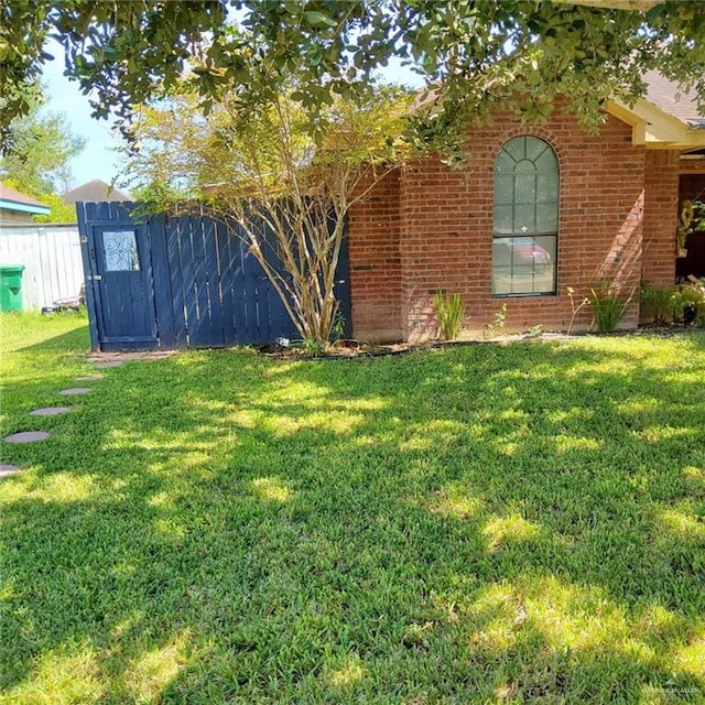 exterior space with a yard