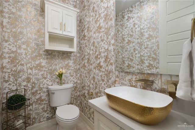 4552 Estancia Pkwy, Mcallen, TX 78504 - half bathroom with wallpapered walls and vanity