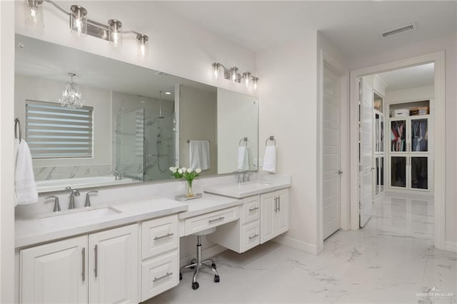 4552 Estancia Pkwy, Mcallen, TX 78504 - full bathroom featuring a marble finish shower, double vanity, marble finish floors, and a spacious closet