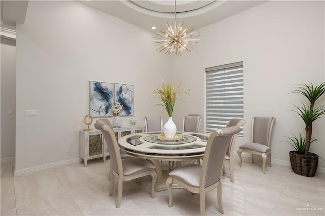 4552 Estancia Pkwy, Mcallen, TX 78504 - dining room with a chandelier, light tile patterned flooring, and a towering ceiling