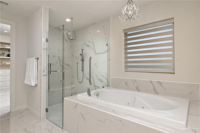 4552 Estancia Pkwy, Mcallen, TX 78504 - bathroom with a marble finish shower, a jetted tub, marble finish floors, and a chandelier