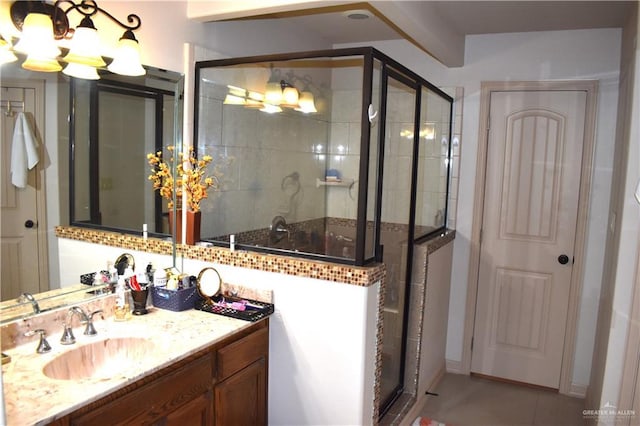 2515 E Q St, Hidalgo, TX 78557 - full bathroom with vanity, a stall shower, and a chandelier