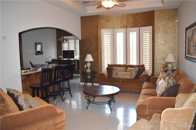 2515 E Q St, Hidalgo, TX 78557 - living area with a ceiling fan, arched walkways, and a raised ceiling