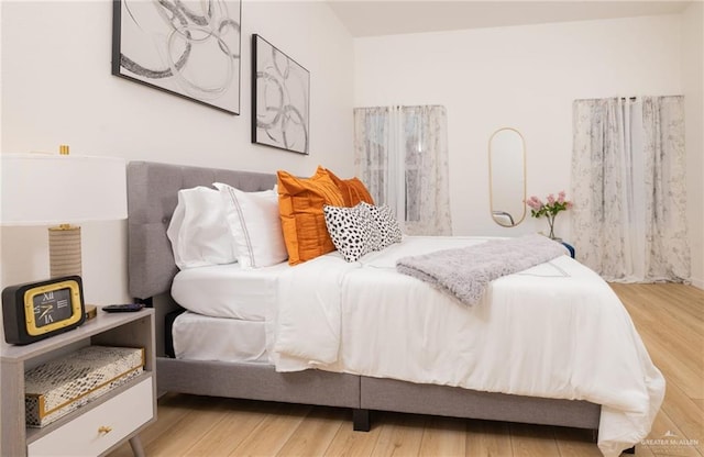 bedroom featuring hardwood / wood-style flooring