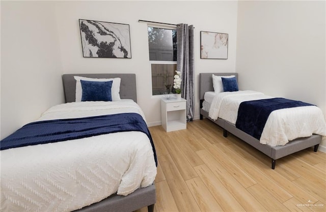 bedroom featuring hardwood / wood-style flooring