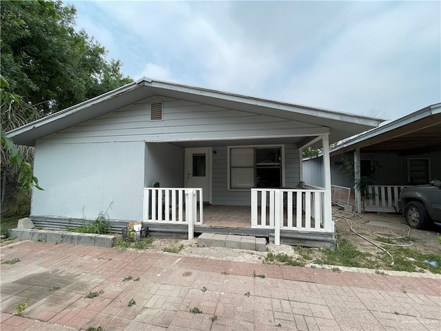 813 Linda St, Mission, TX 78572 - view of front of home featuring covered porch