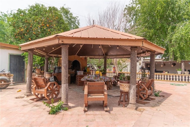 view of patio featuring a gazebo