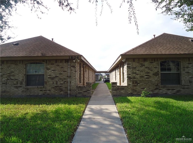 view of home's exterior featuring a yard