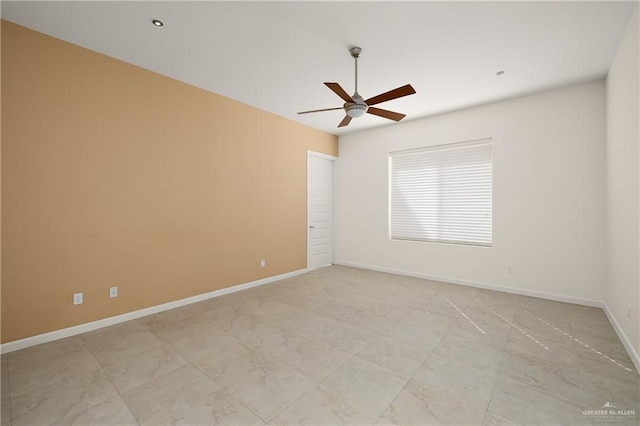 unfurnished room featuring ceiling fan