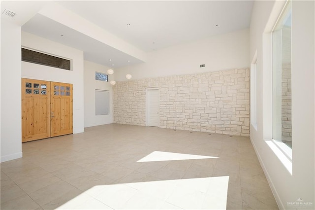 empty room with a towering ceiling