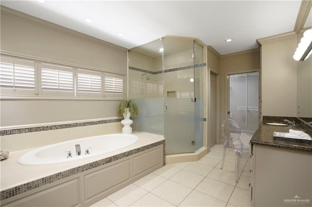 bathroom with tile patterned floors, vanity, crown molding, and plus walk in shower