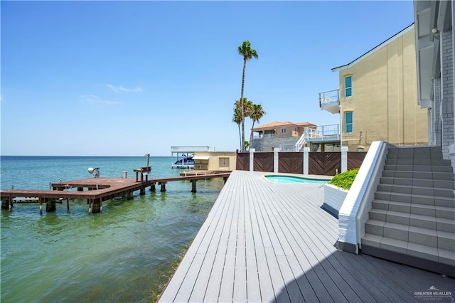 dock area featuring a water view