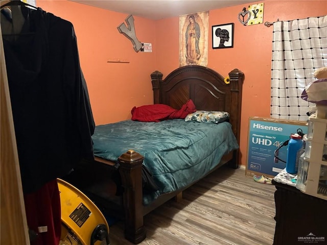609 S 24th St, Donna, TX 78537 - bedroom with wood finished floors