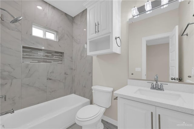 3007 S Livingston St, Edinburg, TX 78542 - full bath featuring vanity, toilet, tub / shower combination, and baseboards