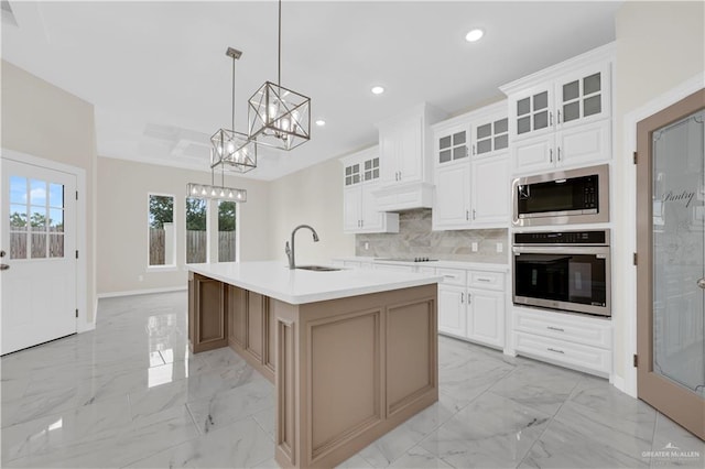 3007 S Livingston St, Edinburg, TX 78542 - kitchen featuring stainless steel appliances, a sink, light marble finish flooring, a chandelier, and recessed lighting