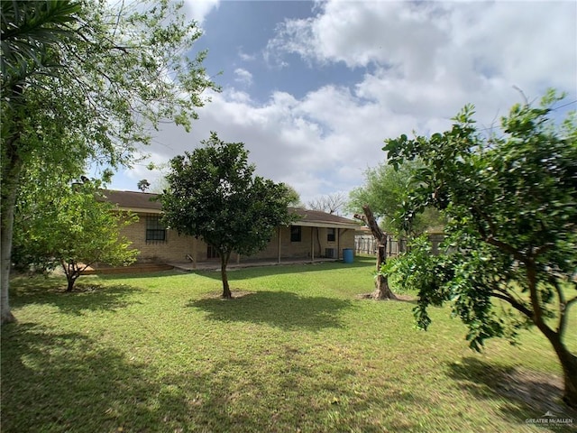 view of yard with fence