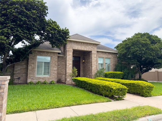 view of front of home with a front yard