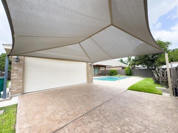 exterior space featuring a fenced in pool