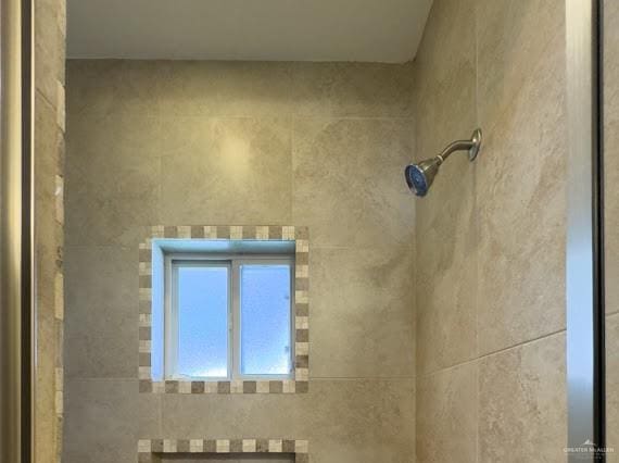 room details with a tile shower