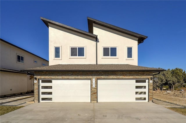 view of front of home with a garage