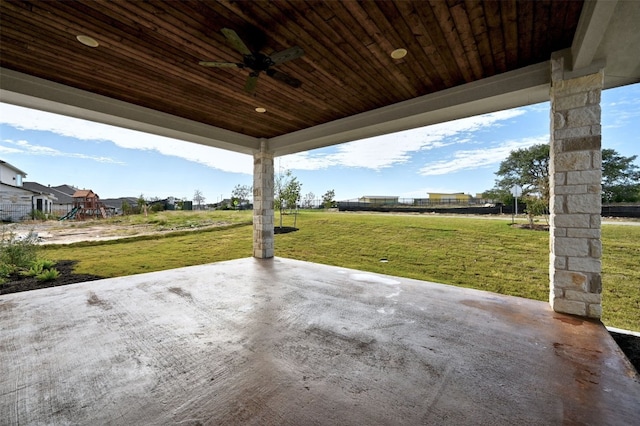 view of patio featuring a playground and ceiling fan