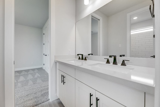 bathroom featuring double sink vanity