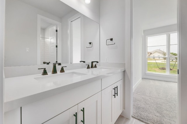 bathroom featuring double sink vanity