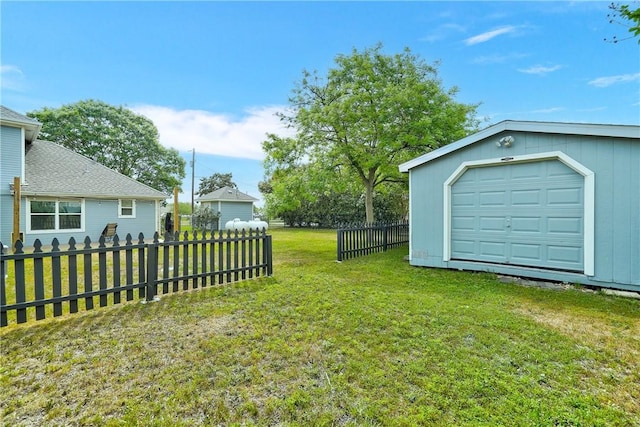 view of yard with a garage