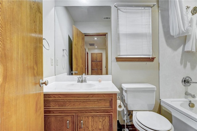 full bathroom with vanity, toilet, and tub / shower combination