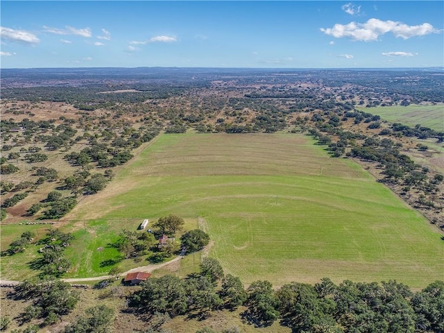 birds eye view of property featuring a rural view