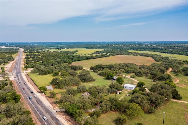 birds eye view of property featuring a rural view