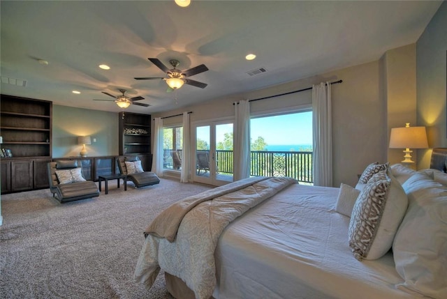 carpeted bedroom with ceiling fan and access to exterior