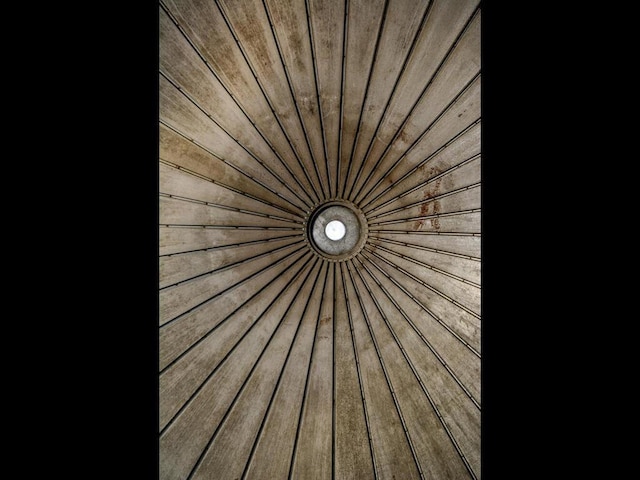 exterior details featuring wood ceiling