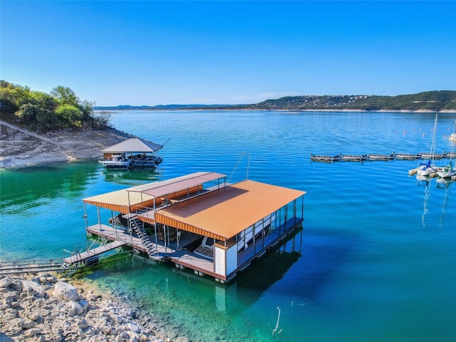 dock area with a water view