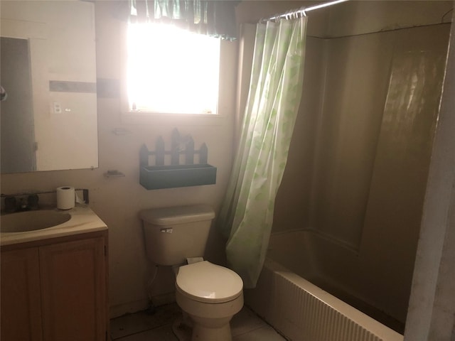 full bathroom featuring shower / bath combo with shower curtain, toilet, tile flooring, and vanity