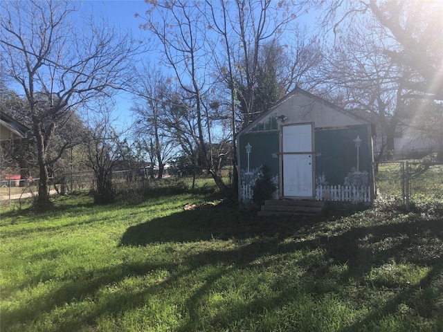 view of shed / structure featuring a lawn