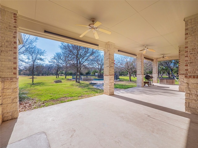 view of patio / terrace featuring ceiling fan and grilling area