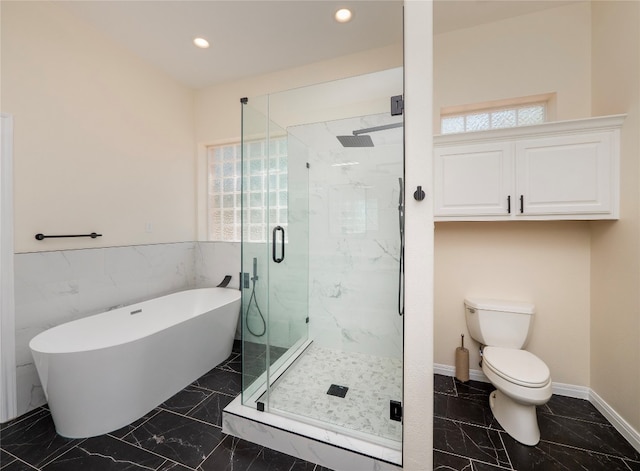 bathroom featuring toilet, separate shower and tub, and tile floors