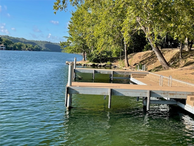 view of dock featuring a water view