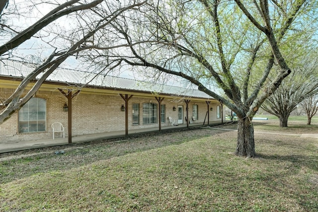 exterior space with a front lawn