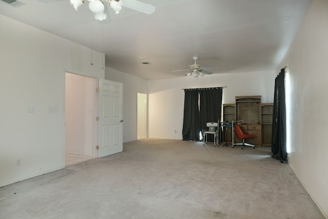 carpeted empty room with ceiling fan